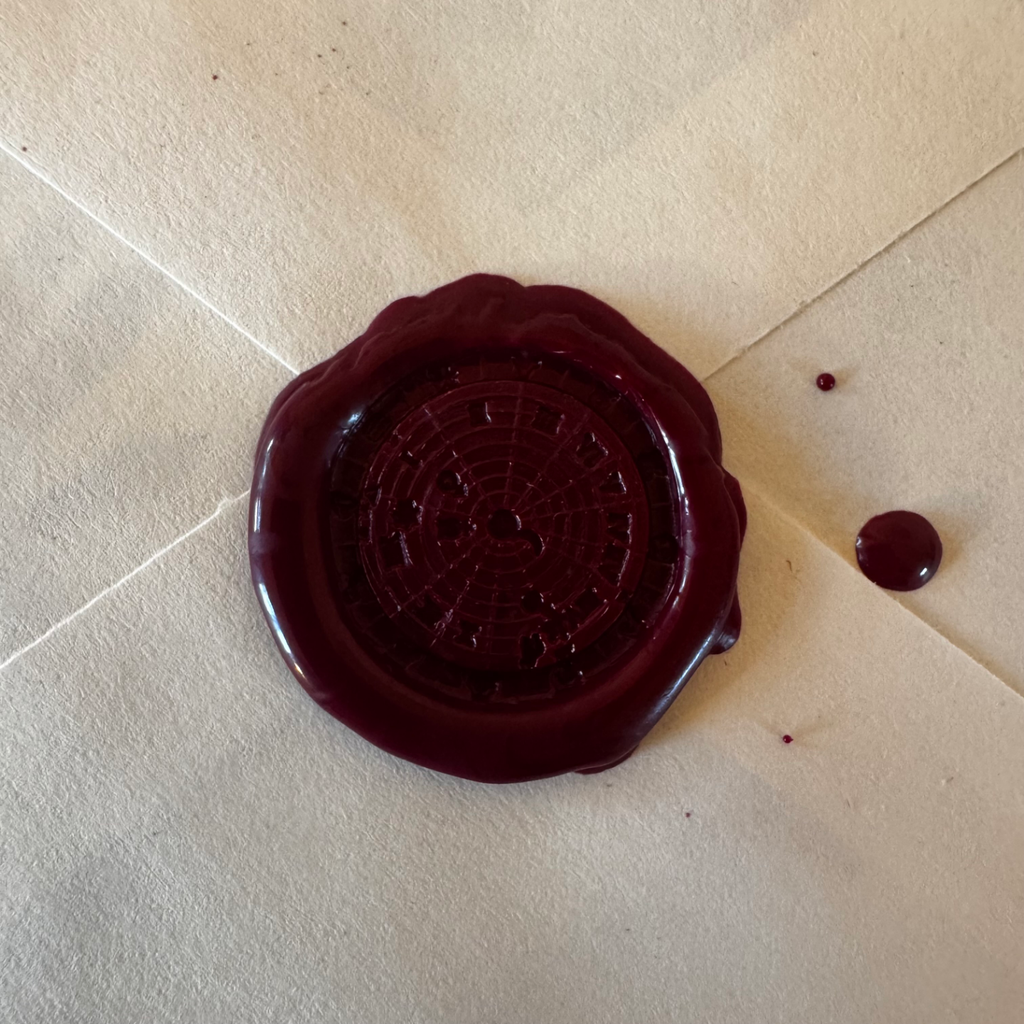 SkySignet ring with wax seal impression